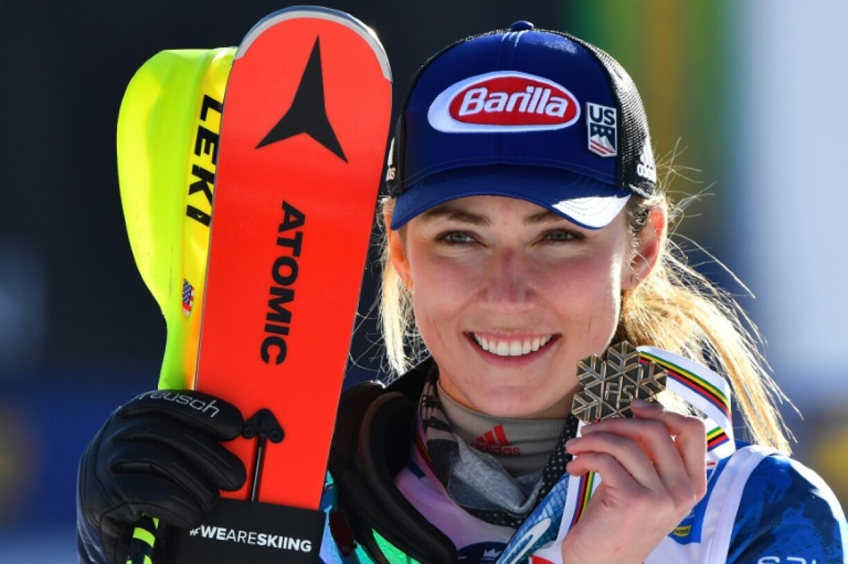 Shiffrin celebrates on the podium after slalom bronze in Cortina