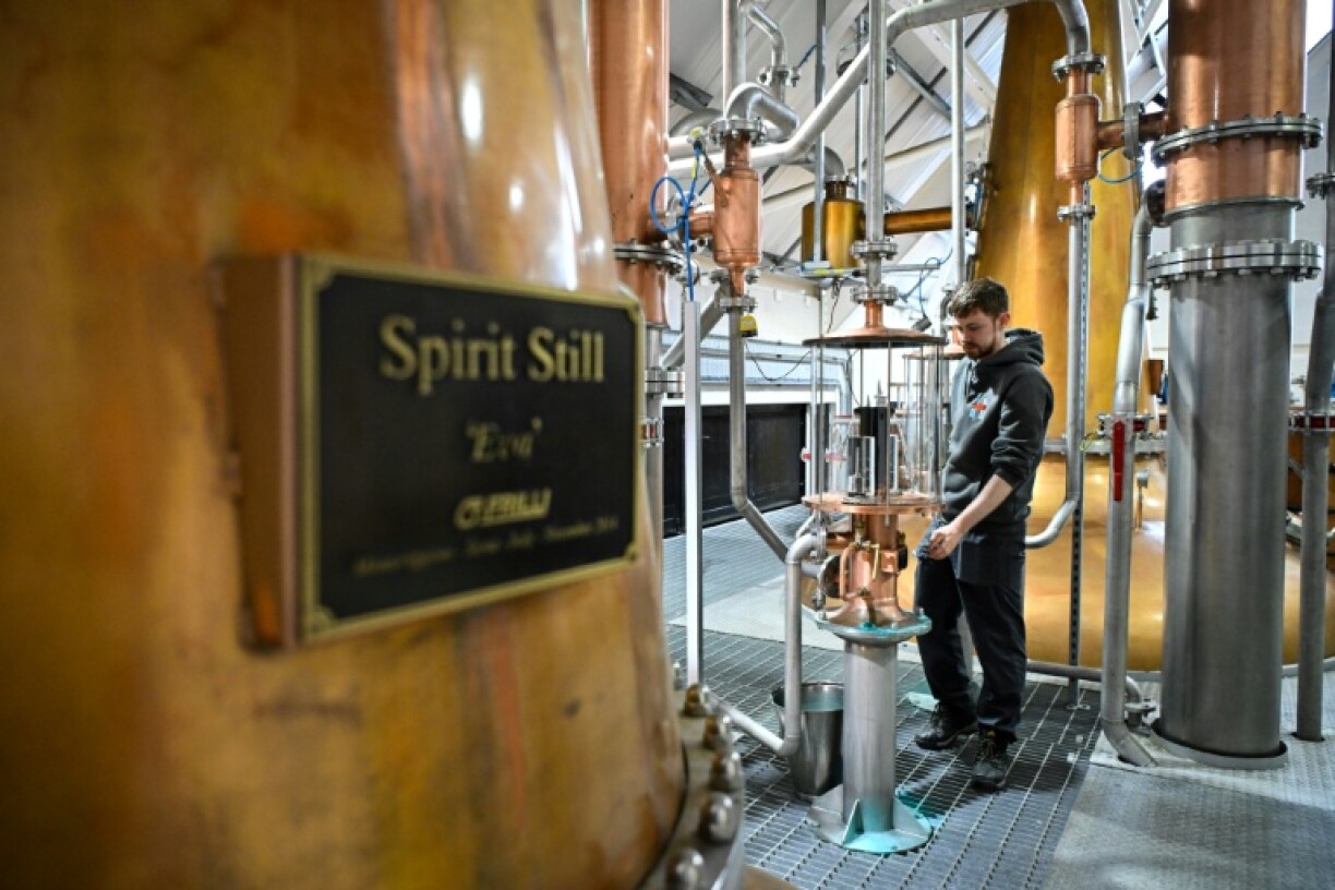 Distiller Thomas McRae works at the Isle of Harris Distillery in Tarbert, on Harris, Scotland, which has just announced layoffs sparking fears more young people will be forced to leave the remote island in search of work