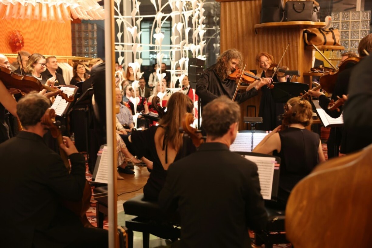 The Versailles Royal Opera Orchestra performs at the Printemps store in Lower Manhattan July 21, 2025 during a show called