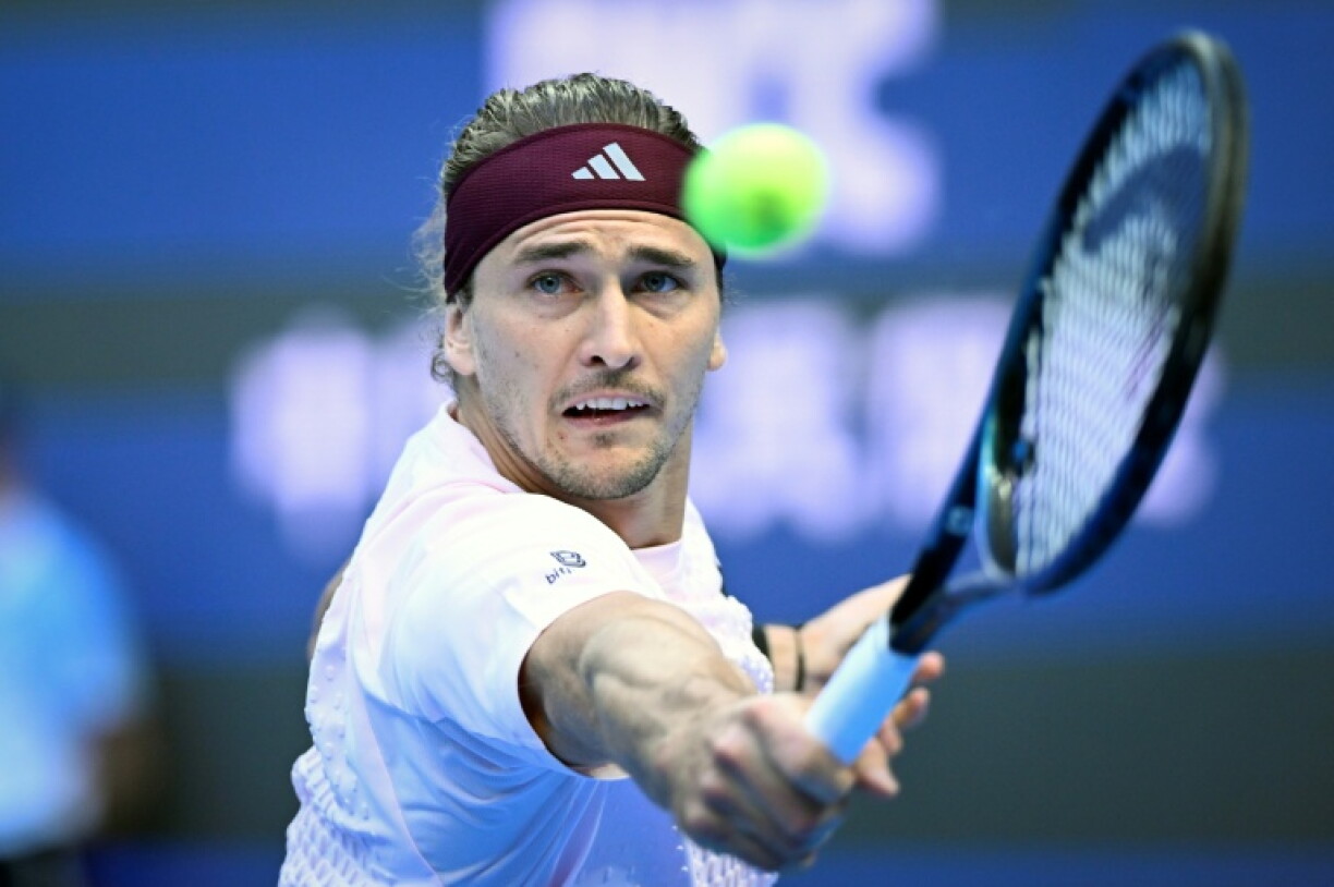 Germany's Alexander Zverev hits a return to Britain's Cameron Norrie during their men's singles first round tennis match at the China Open tennis tournament in Beijing on October 1, 2026.