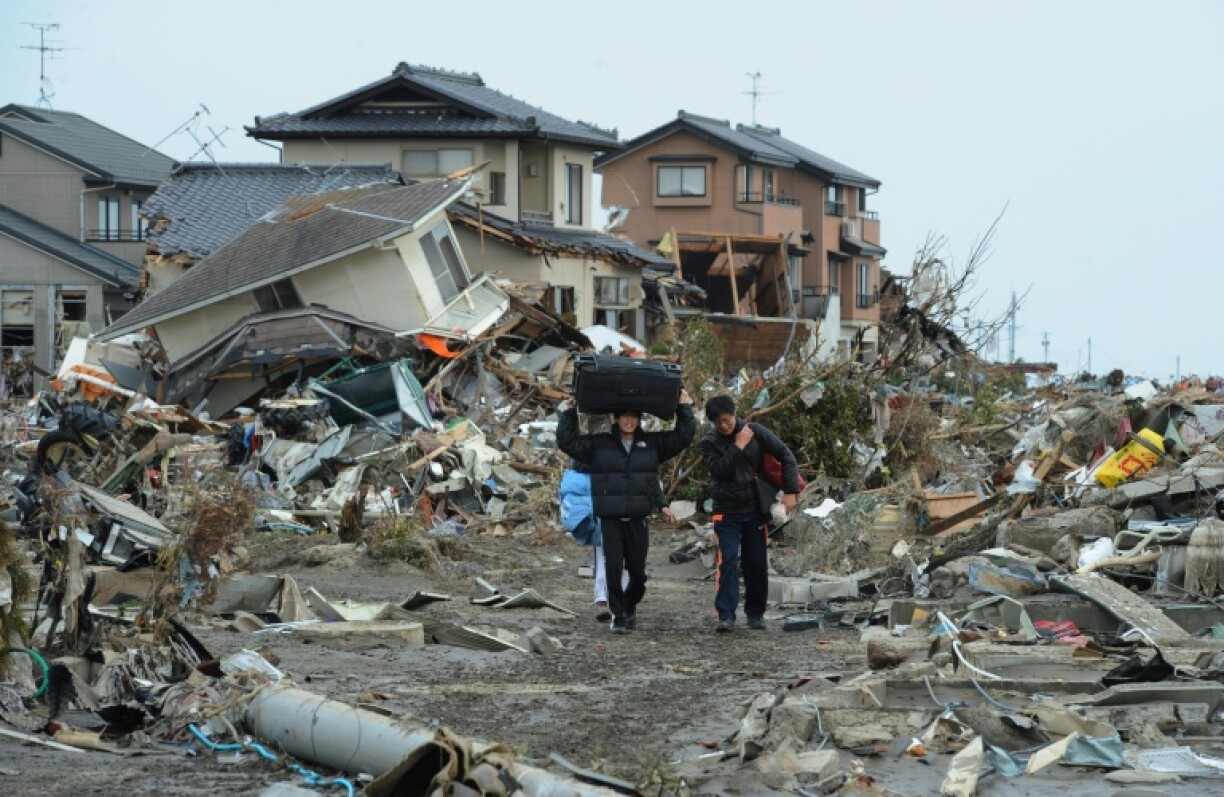 Dans le village de Natori, dans le nord-est du Japon, le 14 mars 2011, trois jours après le séisme et le tsunami