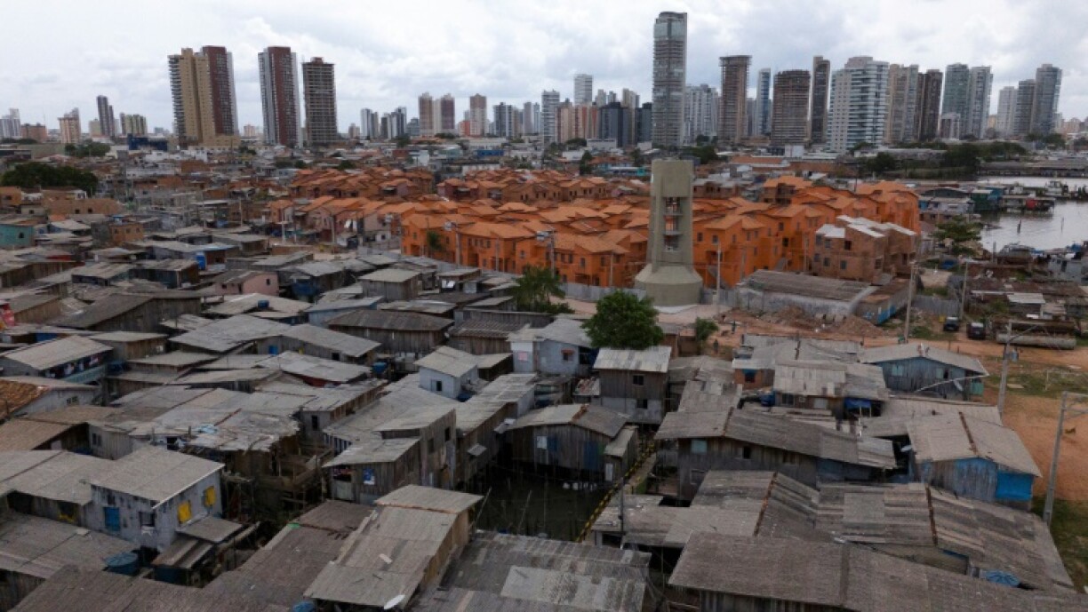 Aerial view of Vila da Barca (bottom), a neighborhood of stilt houses on the banks of the Guama River in Belem