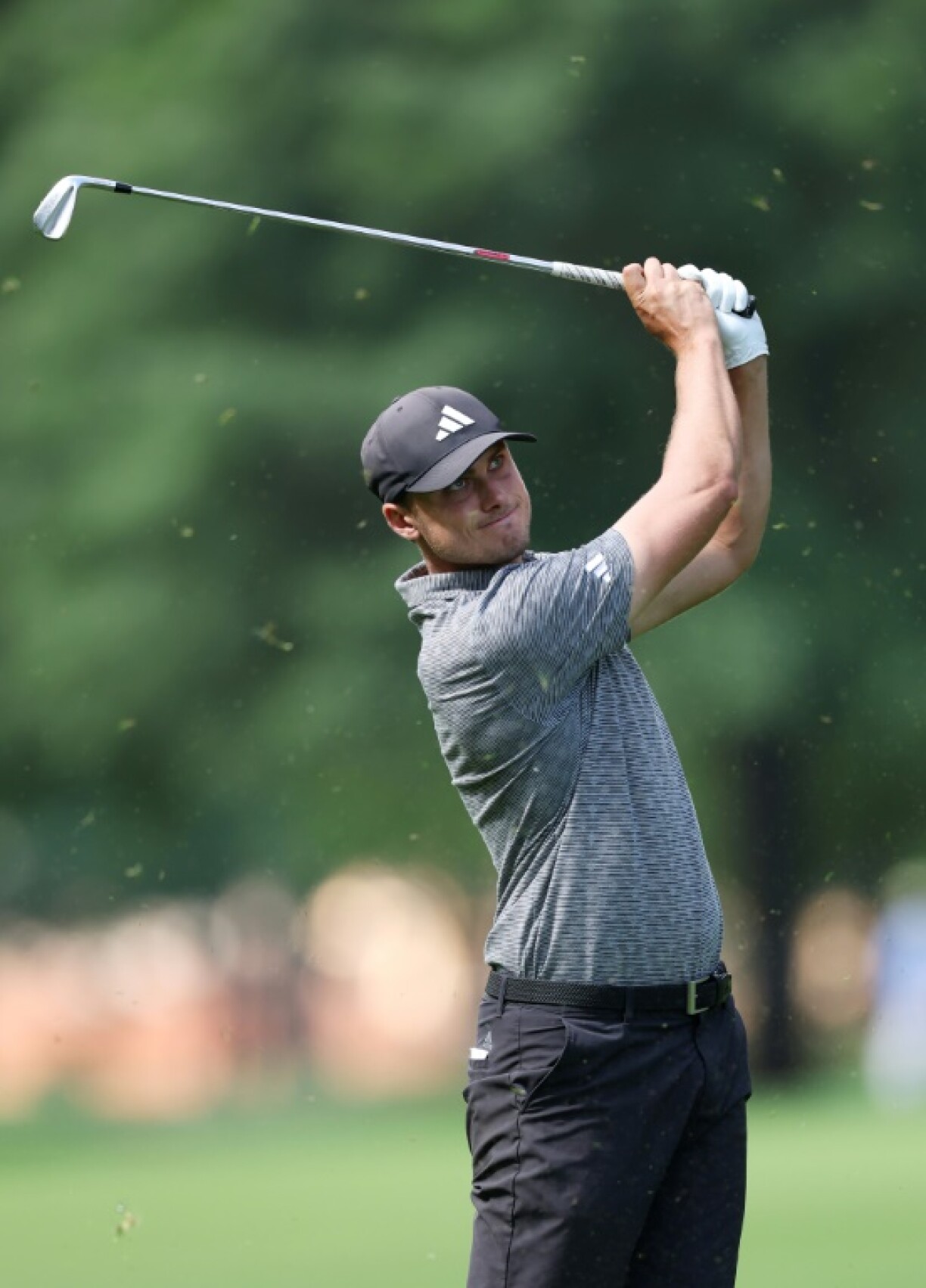 Sixth-ranked Ludvig Aberg of Sweden hits an approach shot during his final practice round before the 107th PGA Championship at Quail Hollow