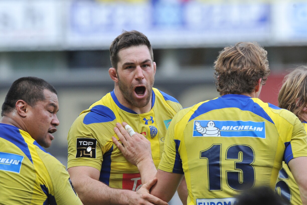 Clermont's Canadian lock Jamie Cudmore (C) jubilates after scoring a try during the French Top 14 rugby union match between Clermont Auvergne (ASM) and Montpellier Herault Rugby Club at the Marcel Michelin stadium in Clermont-Ferrand, central France, on February 22, 2014.