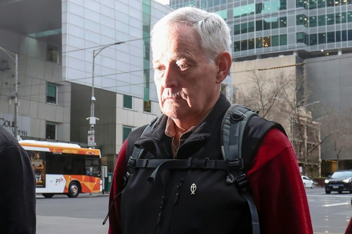 Ian Wilkinson, the only guest to survive a toxic mushroom lunch with Australian murderer Erin Patterson, leaves the Supreme Court of Victoria following a pre-sentencing hearing in Melbourne