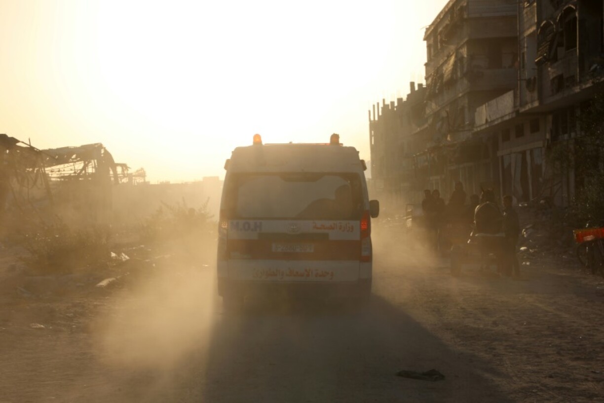 Ambulances transport wounded Palestinians from Kamal Adwan Hospital to Al-Shifa Hospital in Gaza City