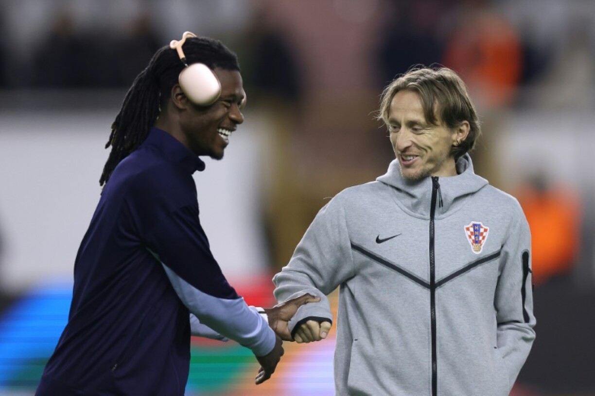 Real Madrid and Croatia midfielder Luka Modric (right) has bought a stake in Championship club Swansea