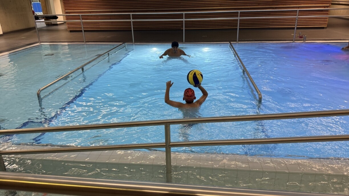 Graduate educator Rachid Habbaz with a patient during the first session under the new convention.