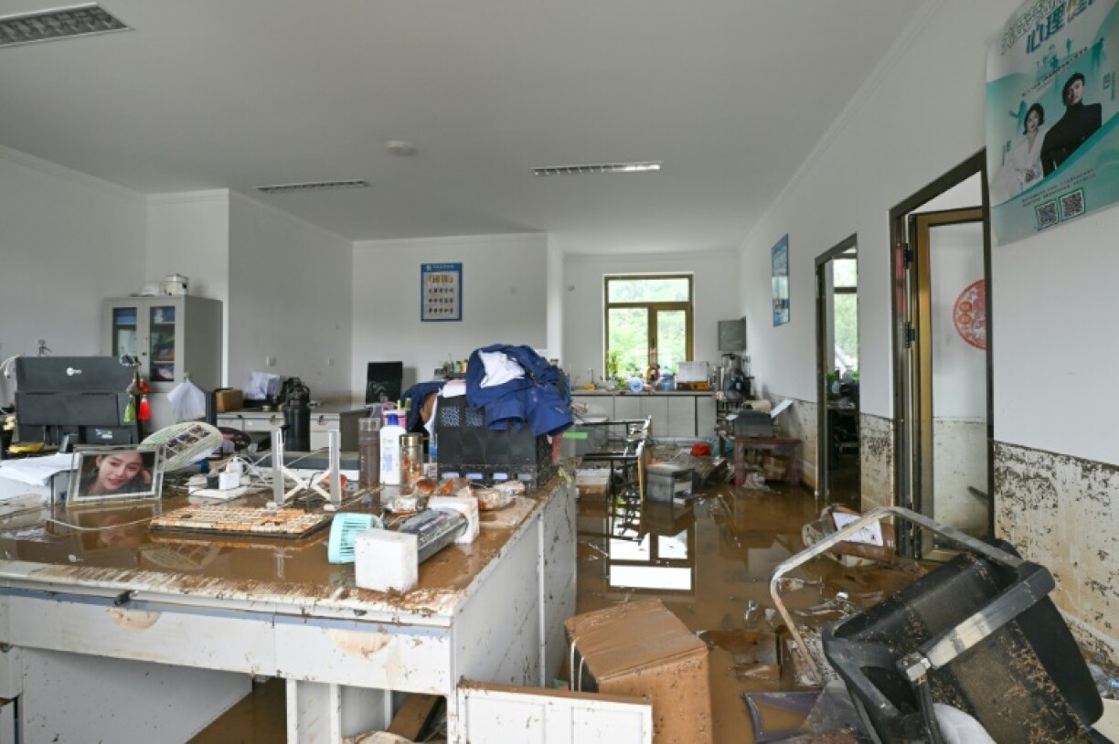 A flood-damaged office is seen following heavy rains in Miyun district, on the outskirts of Beijing on July 29, 2025