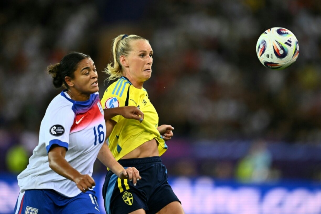 England defender Jess Carter (left) in action against Sweden at the Women's Euros