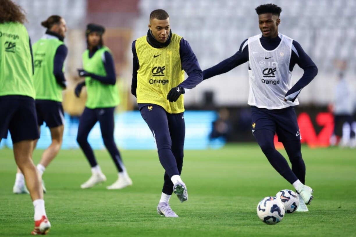 Kylian Mbappe (C) takes part in a training session ahead of France's Nations League quarter-final against Croatia