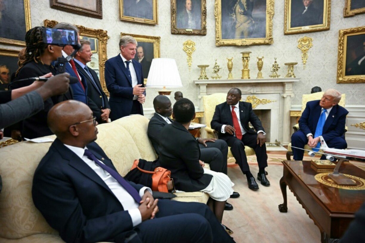South African golfer Ernie Els, standing, speaks during the Oval Office meeting between US President Donald Trump and South African President Cyril Ramaphosa