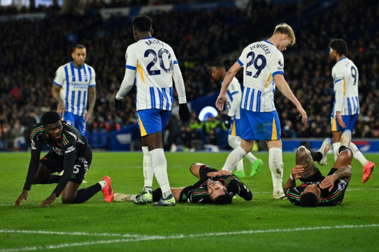Arsenal's Premier League title hopes were hit by a 1-1 draw at Brighton