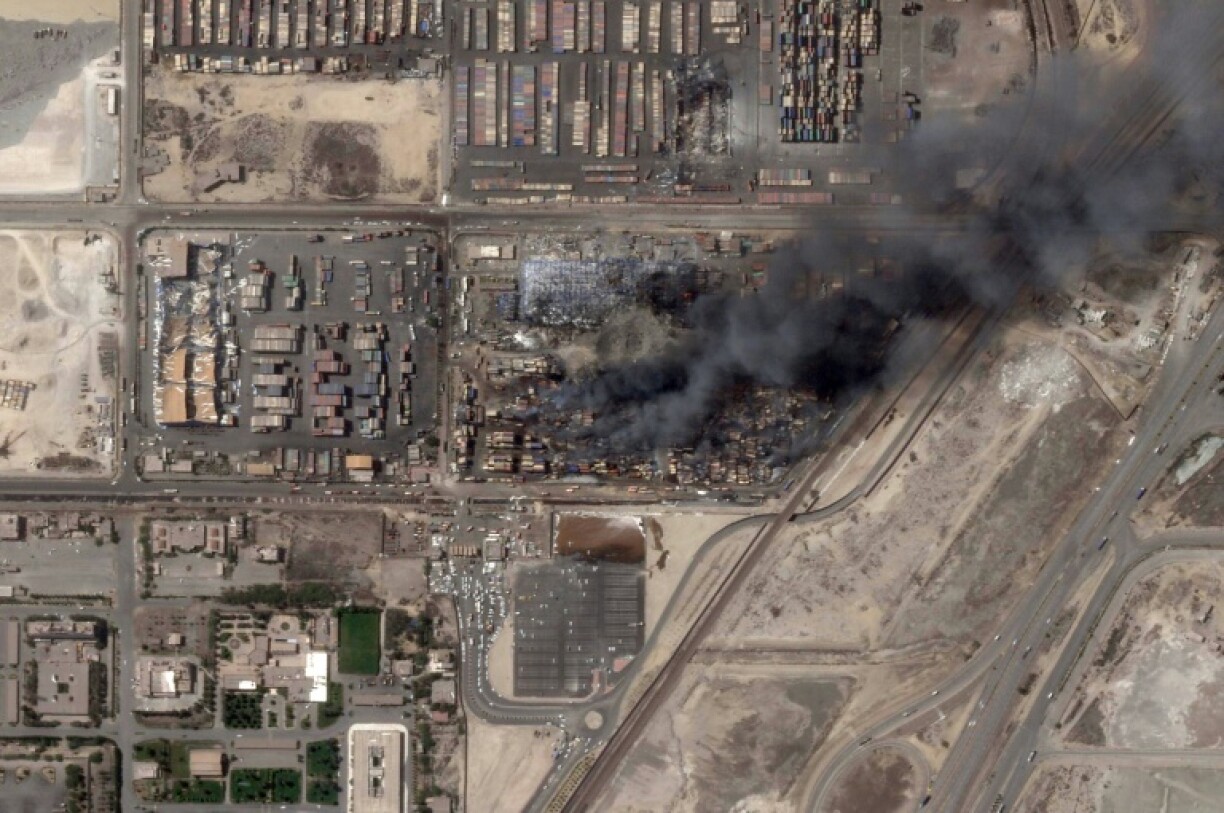 A satellite photo obtained from Planet Labs PBC and dated April 28, 2025 shows a column of smoke billowing after an explosion at Iran's Shahid Rajaee port