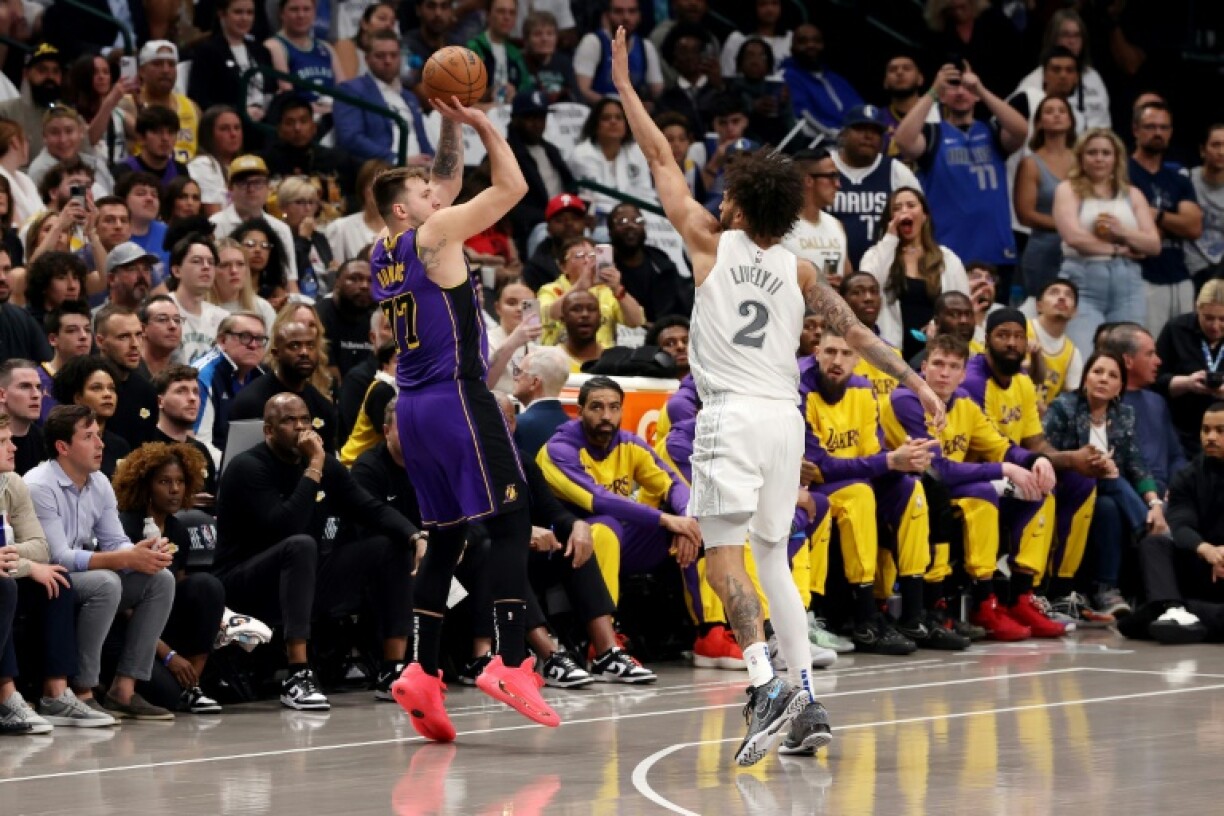 Los Angeles Lakers star Luka Doncic shoots for the basket in an emotional return to Texas to face his former club the Dallas Mavericks