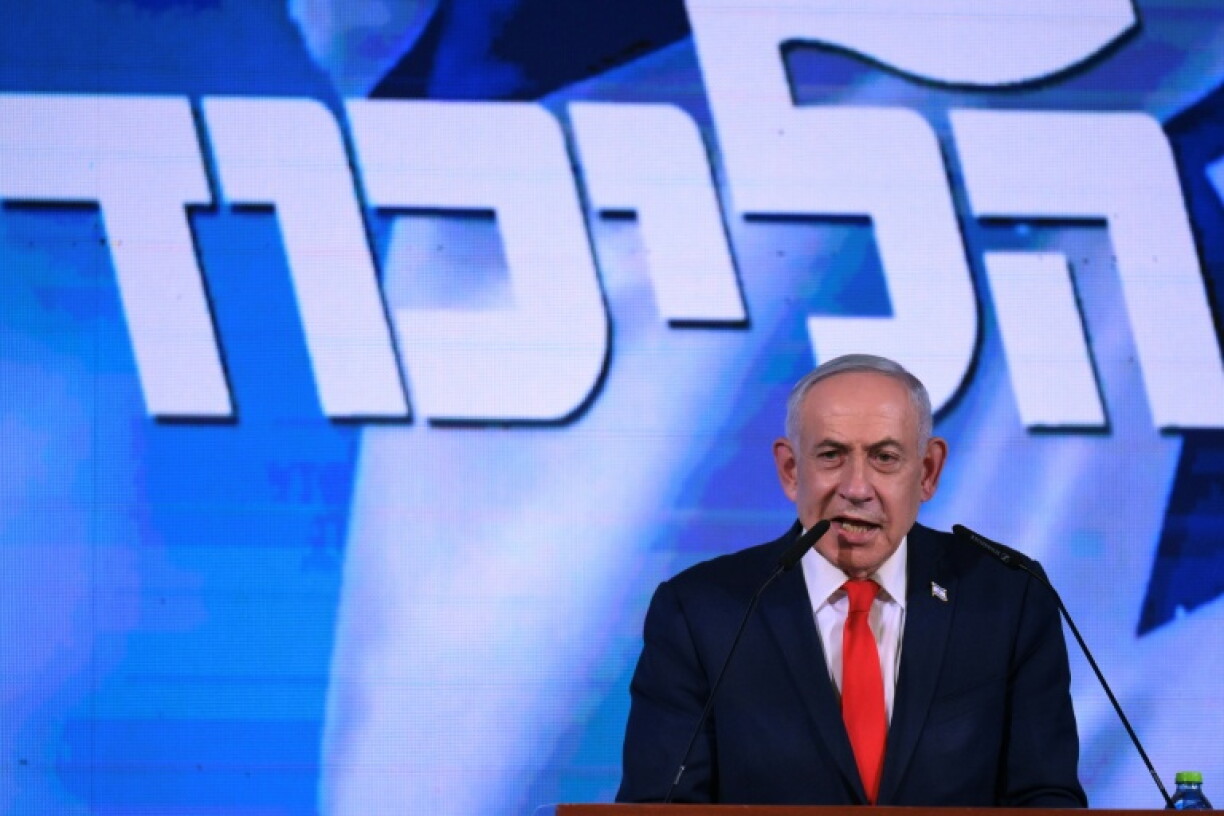 Israel's Prime Minister Benjamin Netanyahu addresses his supporters at an election night rally in Jerusalem