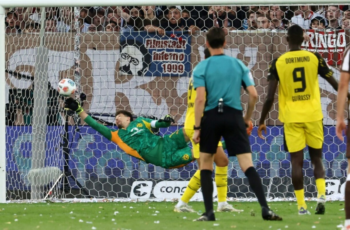 Borussia Dortmund gave away a two-goal lead with five minutes remaining to draw at St Pauli