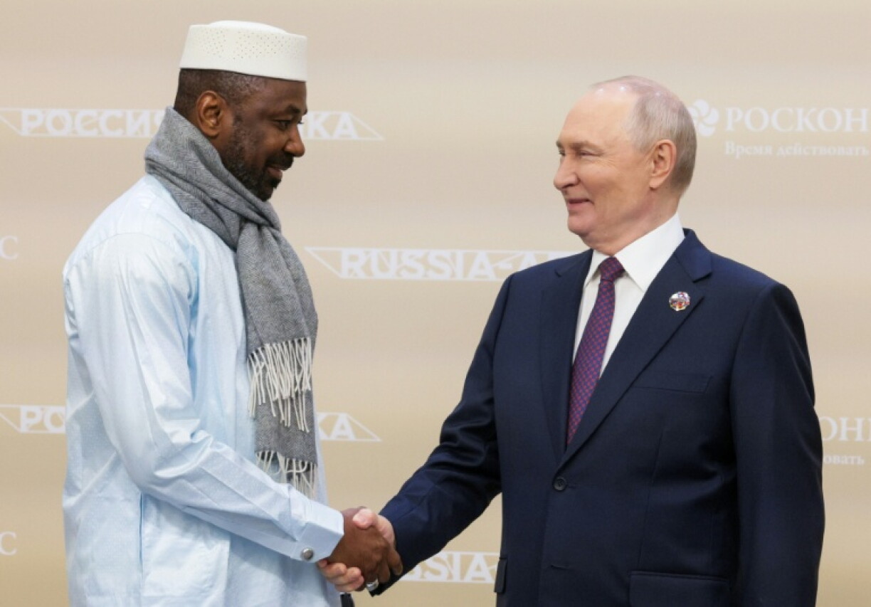 Russian President Vladimir Putin welcomes Mali's junta leader Assimi Goita for the Russia-Africa economic and humanitarian forum in Moscow