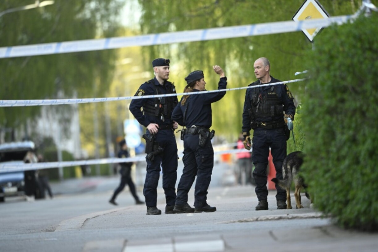 Swedish police sealed off a hair salon in the city of Uppsala where three people were killed in a shootout