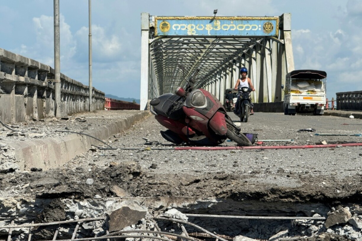 A damaged motorcycle on the Kisapanadi Bridge following Monday's military airstrike on Kyauktaw