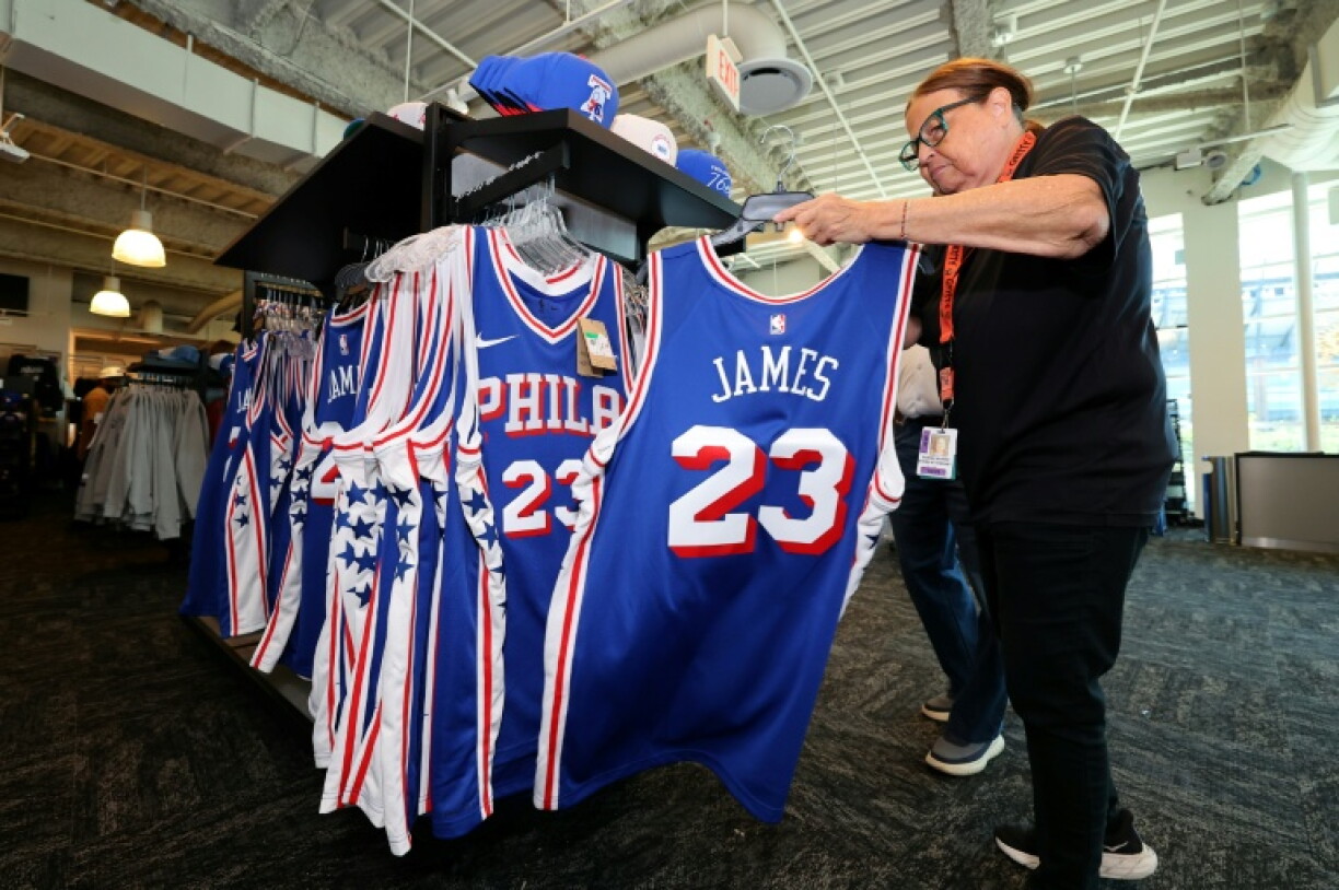 Philadelphia 76ers fans shop for LeBron James jerseys after the four-time NBA MVP joined the Sixers this season in a bid to bring the team its first crown since 1983