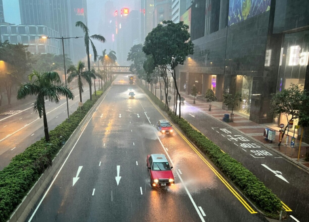 Parts of Hong Kong were brought to a standstill by flooding caused by heavy rains on Tuesday