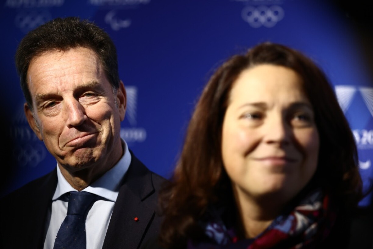 Geoffroy Roux de Bezieux (L) alongside France's Sports Minister Marina Ferrari