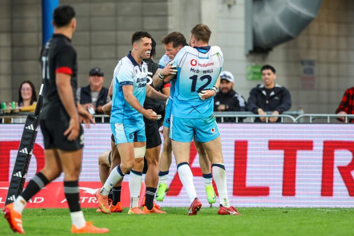 Scotland's players celebrate a try during their rugby match between New Zealand Maori and Scotland at Semenoff Stadium in Whangarei on July 5, 2025.