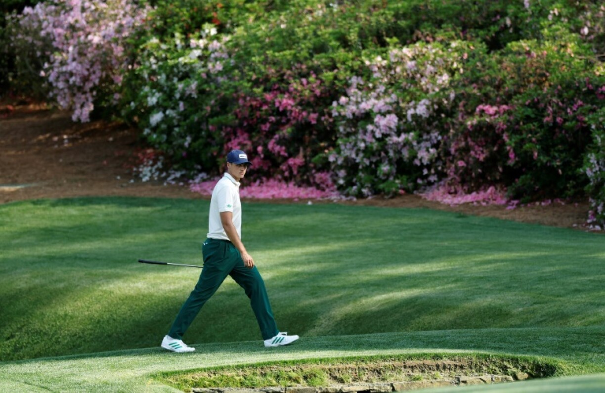 Sweden's Ludvig Aberg walks to the 13th green during the first round of the Masters at Augusta National