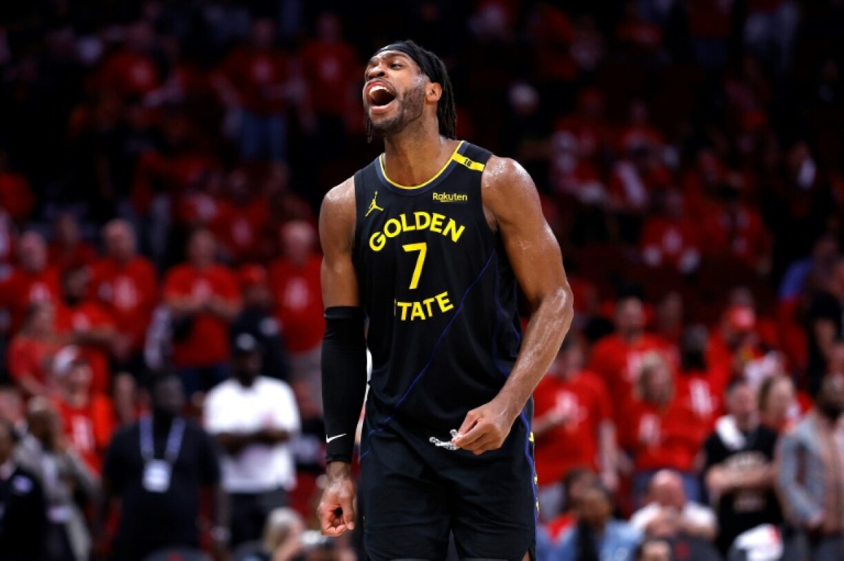 Buddy Hield of the Golden State Warriors celebrates a three-point basket in the Warriors' victory over the Houston Rockets in game seven of their NBA playoff series