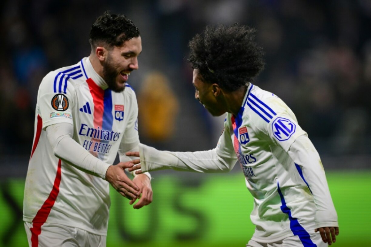 Lyon's Rayan Cherki (L) has been in outstanding form in recent weeks