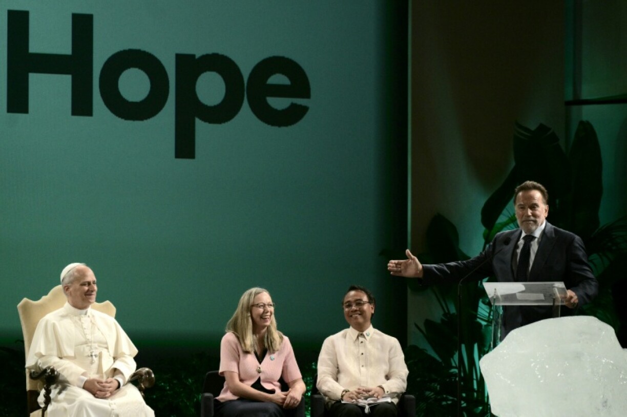 'Terminator' star Arnold Schwarzenegger (R) joked that Pope Leo XIV (L) was an 'action hero' despite his less muscular frame