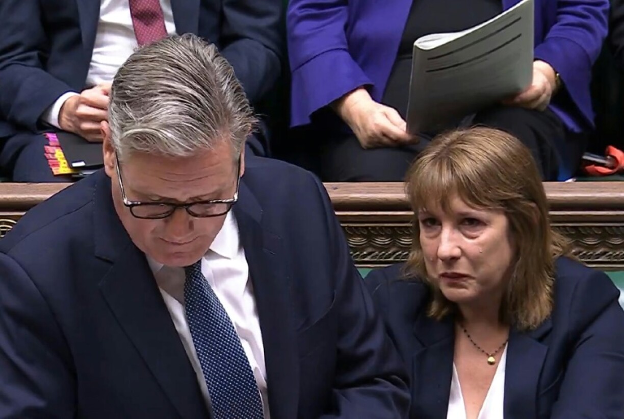 British Prime Minister Keir Starmer, left, with Chancellor of the Exchequer Rachel Reeves in parliament on Wednesday