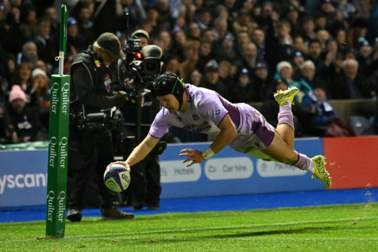 Scotland wing Darcy Graham dives over the line to score a try during an 85-0 thrashing of the United States in Edinburgh