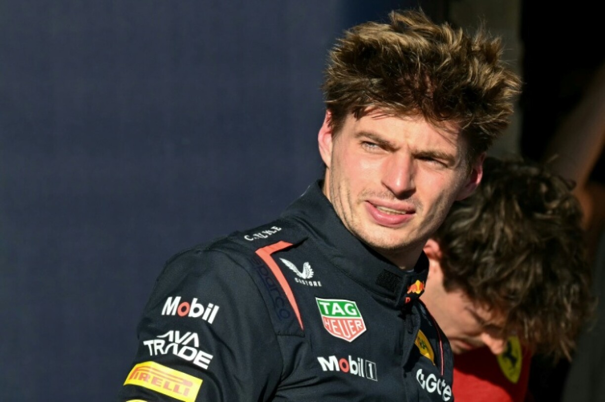 Red Bull Racing's Dutch driver Max Verstappen relaxes after winning the pole position during the qualifying session for the United States Formula One Grand Prix at the Circuit of the Americas in Austin, Texas