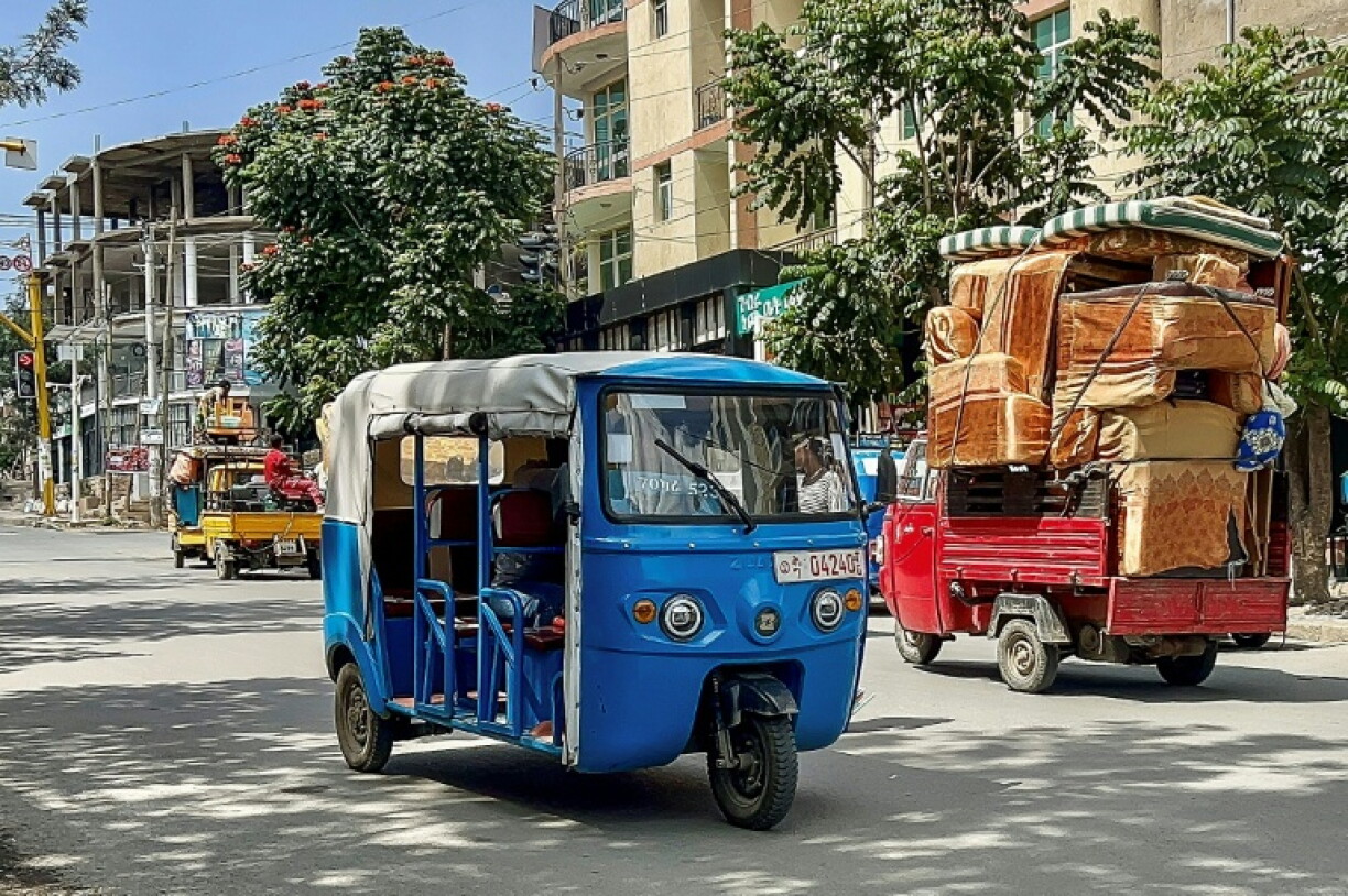 A tuk-tuk makes its way through Mekelle amid reports the airport had fallen to a pro-government militia