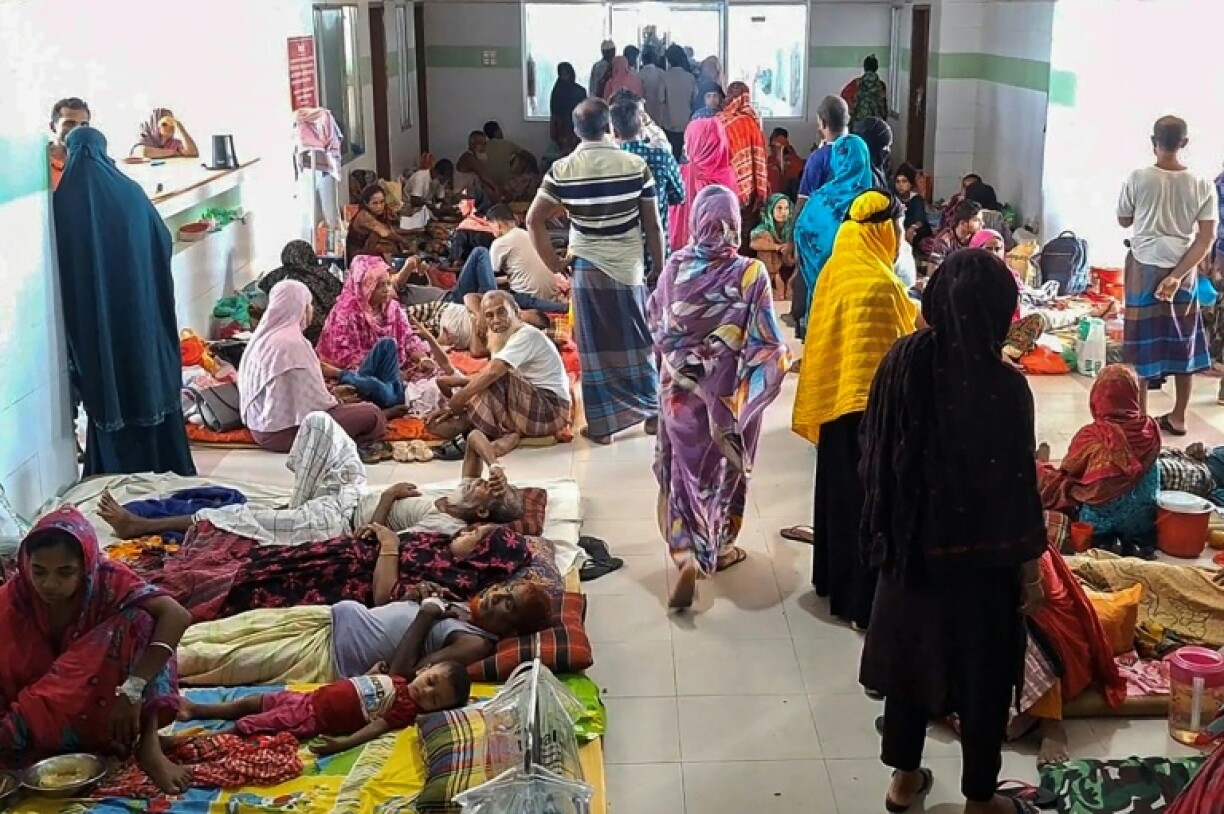 Dengue patients along with their family members are pictured at a hospital in Barguna in southern Bangladesh