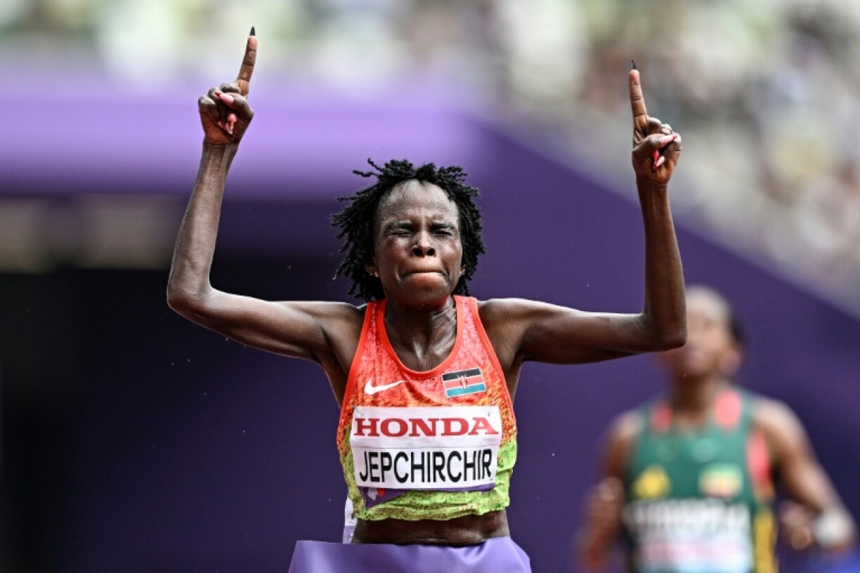 Kenya's Peres Jepchirchir celebrates winning the women's marathon at the world championships in Tokyo
