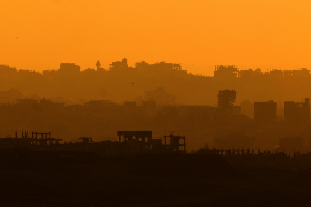 A picture taken from Israeli border with the Gaza Strip shows destruction from Israeli bombardment