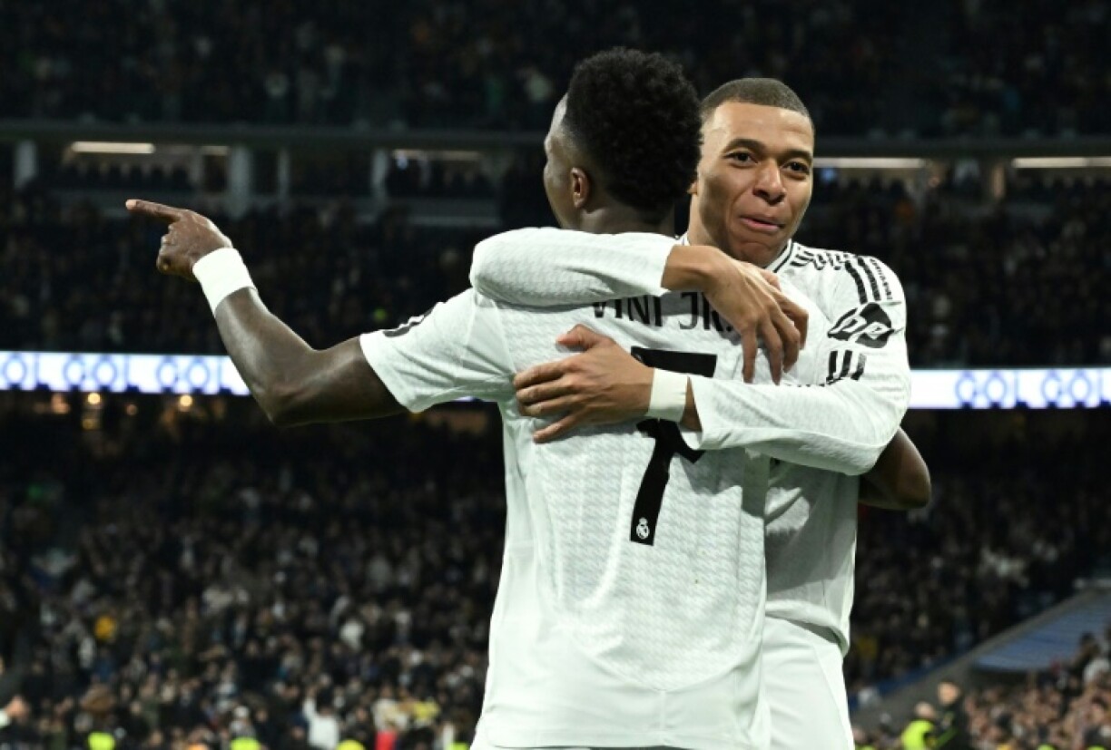 The best could be yet to come for Real Madrid's Brazilian forward Vinicius Junior and Kylian Mbappe (R)