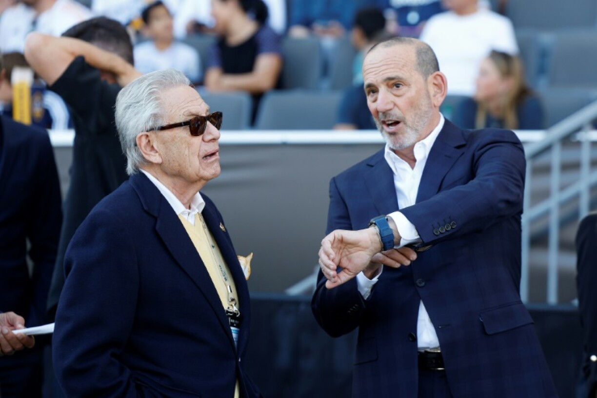 MLS Commissioner Don Garber (R) pictured with owner of Los Angeles Galaxy Philip Anschutz.
