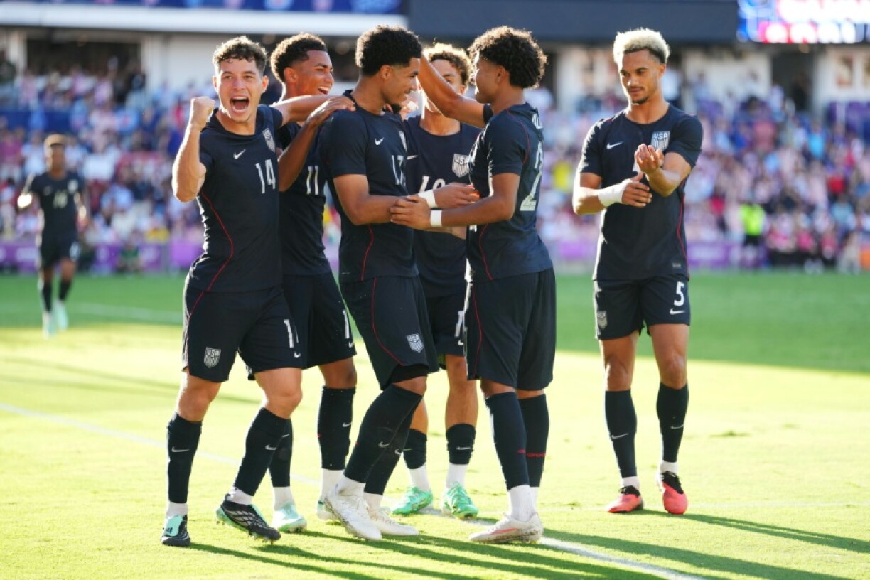 Malik Tillman is congratulated after scoring the USA's second goal in a 4-1 victory over Peru