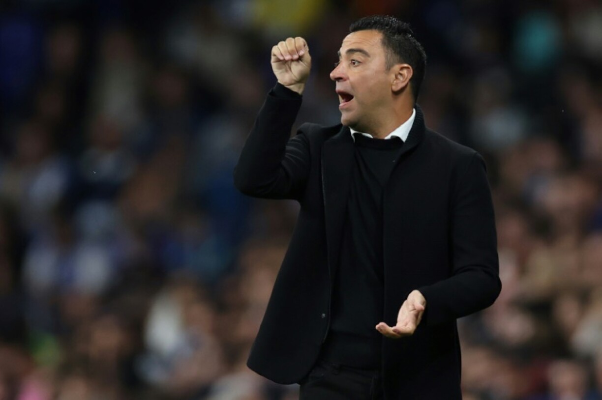 L'entraîneur du FC Barcelone Xavi le 14 mai 2023 sur la pelouse de l'Espanyol: en s'imposant 4-2, ses joueurs ont remporté le 27e titre de champion d'Espagne du Barça