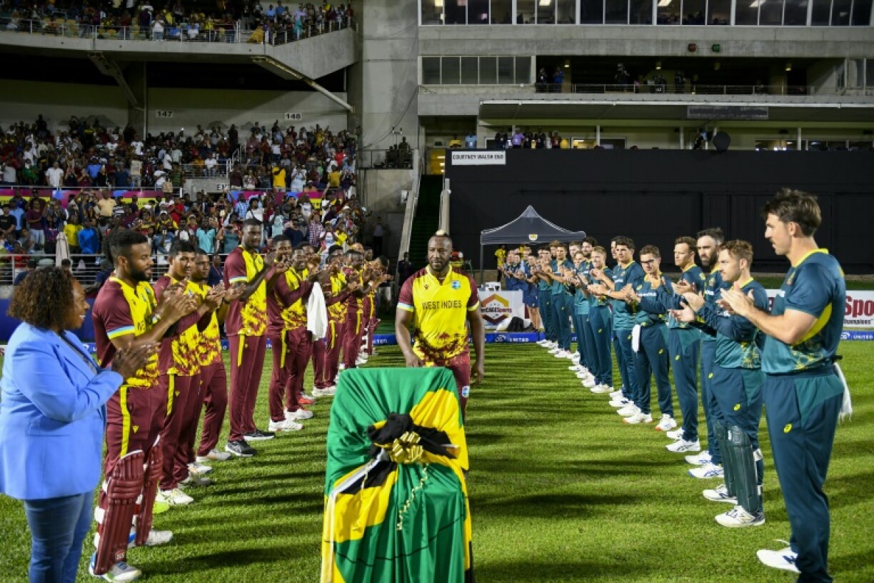 Andre Russell of West Indies is given a guard of honour before his final appearance for the West Indies in Kingston