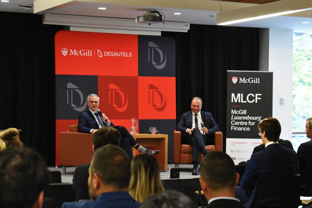 De Patrick Augustin vun der McGill University an de Lëtzebuerger Finanzminister Gilles Roth