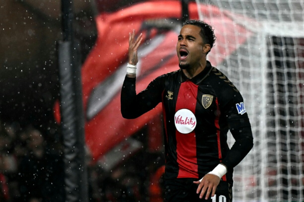 Bournemouth's Dutch striker Justin Kluivert celebrates scoring the team's first goal against AC Milan