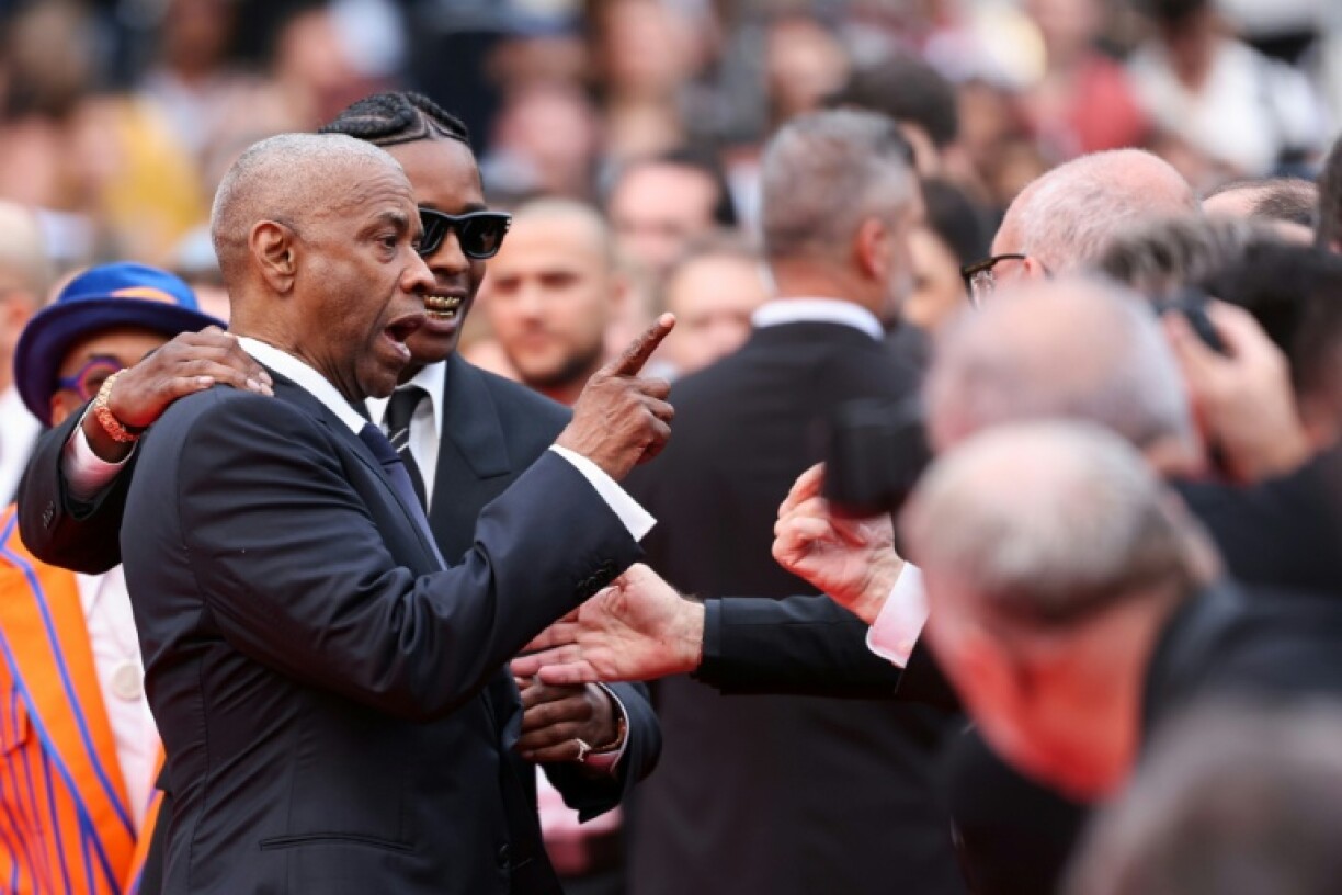 US actor Denzel Washington ticks off a photographer at the Cannes film festival