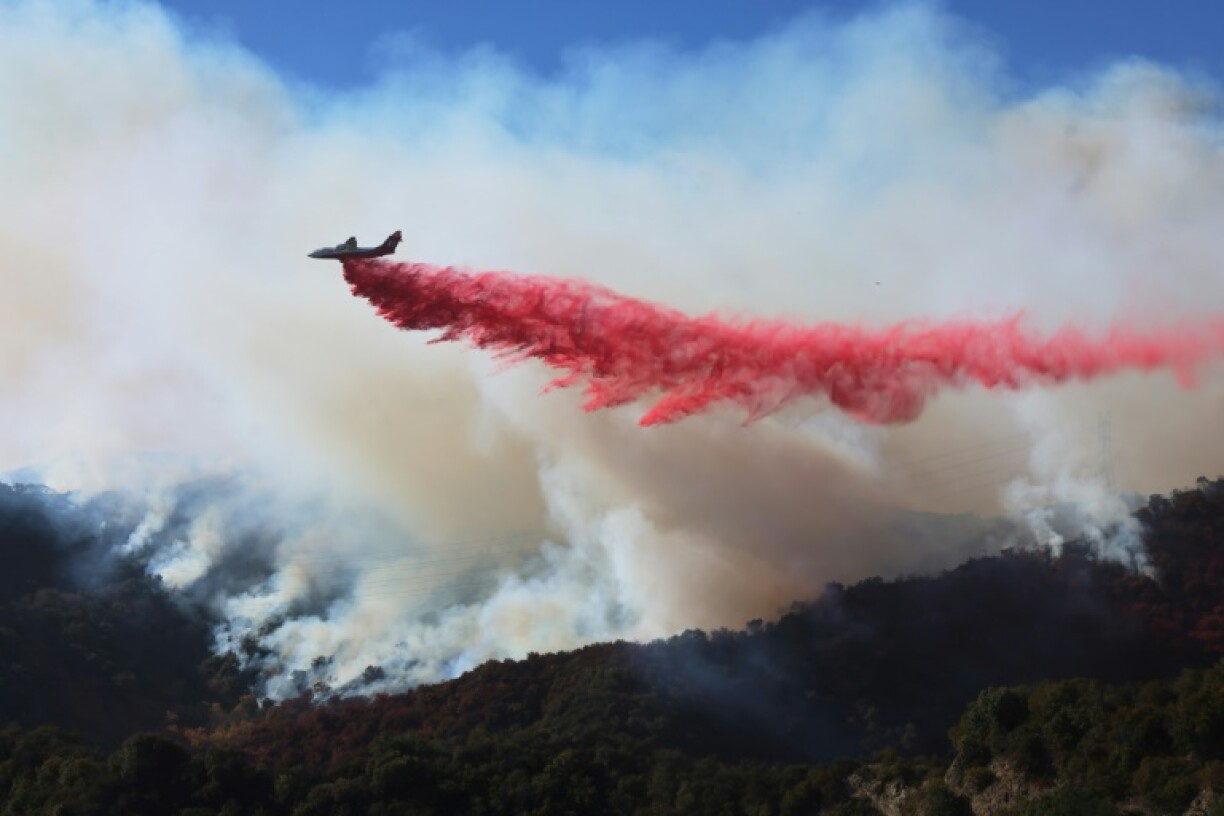 Retardant is dropped as the Palisades Fire grows near Encino Hills, California, on January 11, 2025