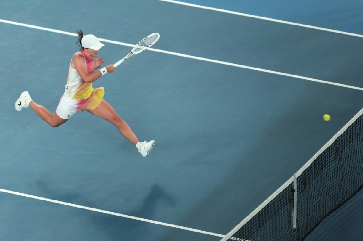 Poland's Iga Swiatek hits a shot against USA's Madison Keys