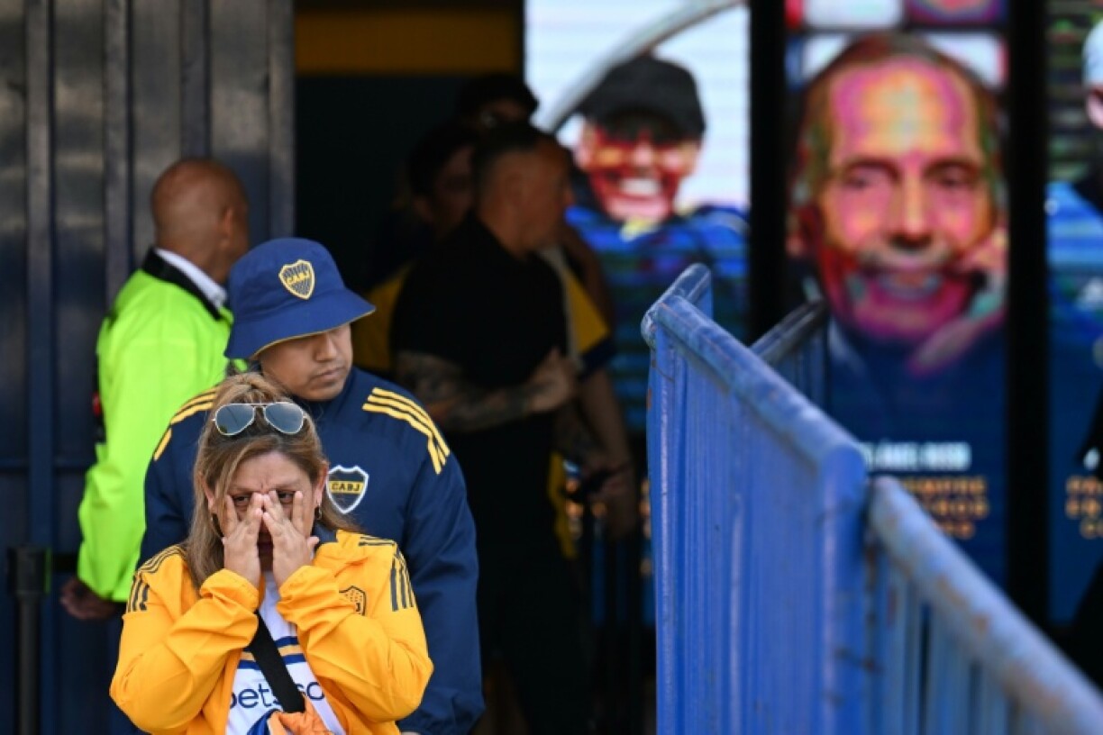 Argentine football supporters pay their respects to Boca Juniors' deceased manager Miguel Angel Russo in a rousing send-off at the legendary Bombonera stadium
